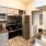 a kitchen with marble counters