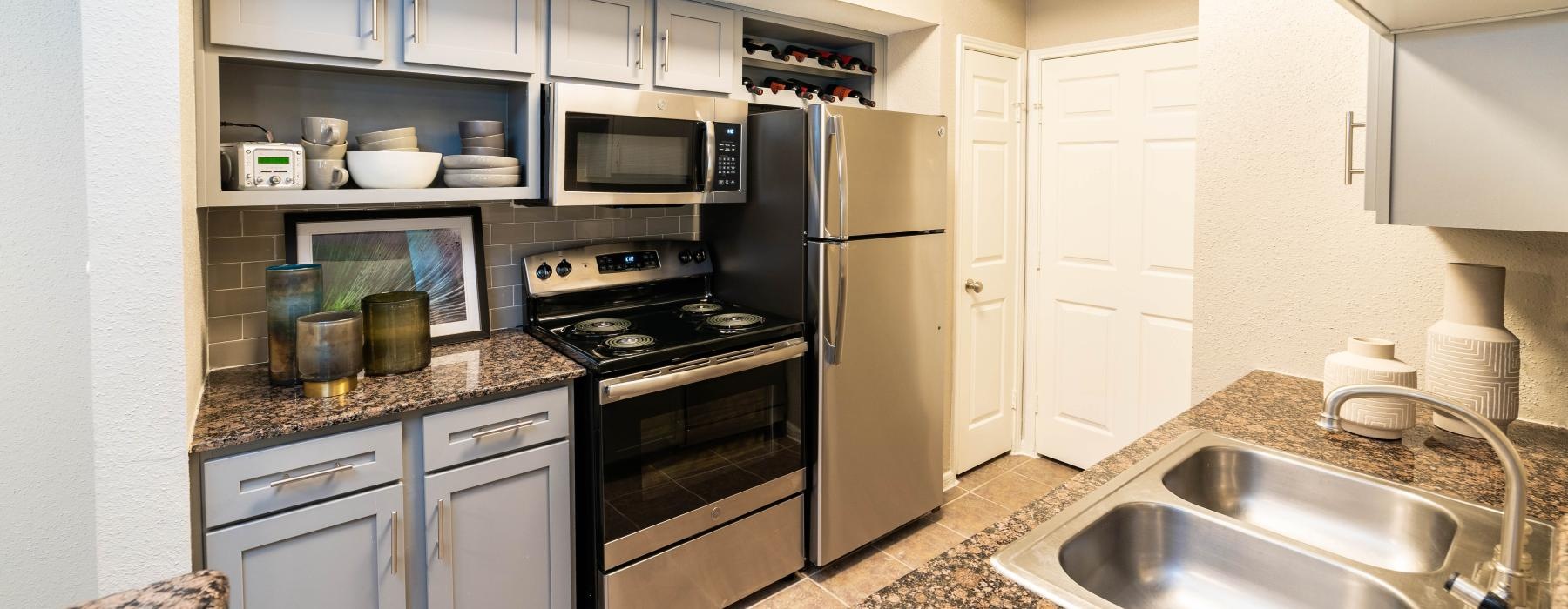 a kitchen with stainless steel appliances