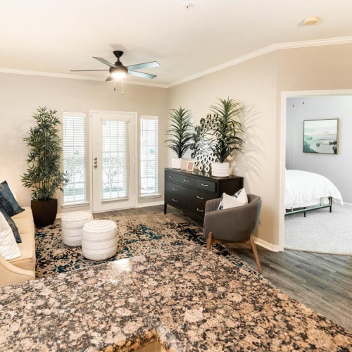 a living room with a large rug