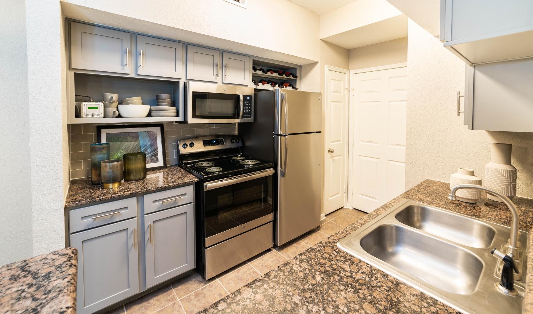 a kitchen with stainless steel appliances